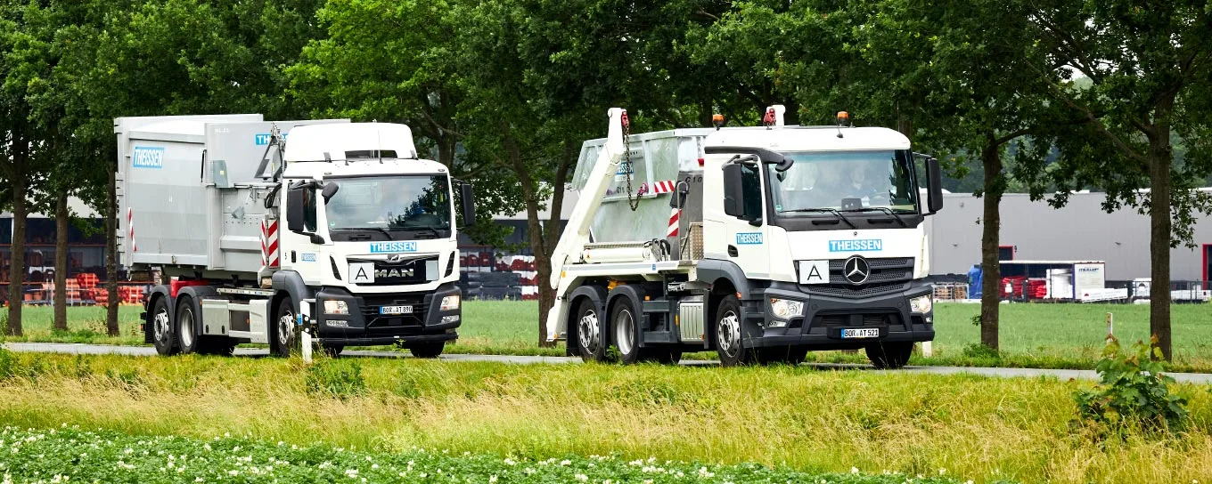 Überkopflader mit Container